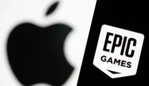 Smartphone with Epic Games logo is seen in front of Apple logo in an illustration